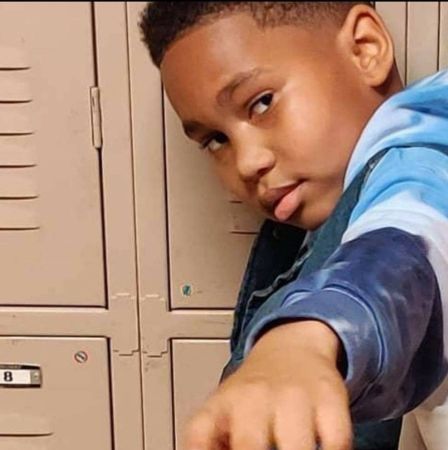 Ja' Siah young is posing for the photo. 